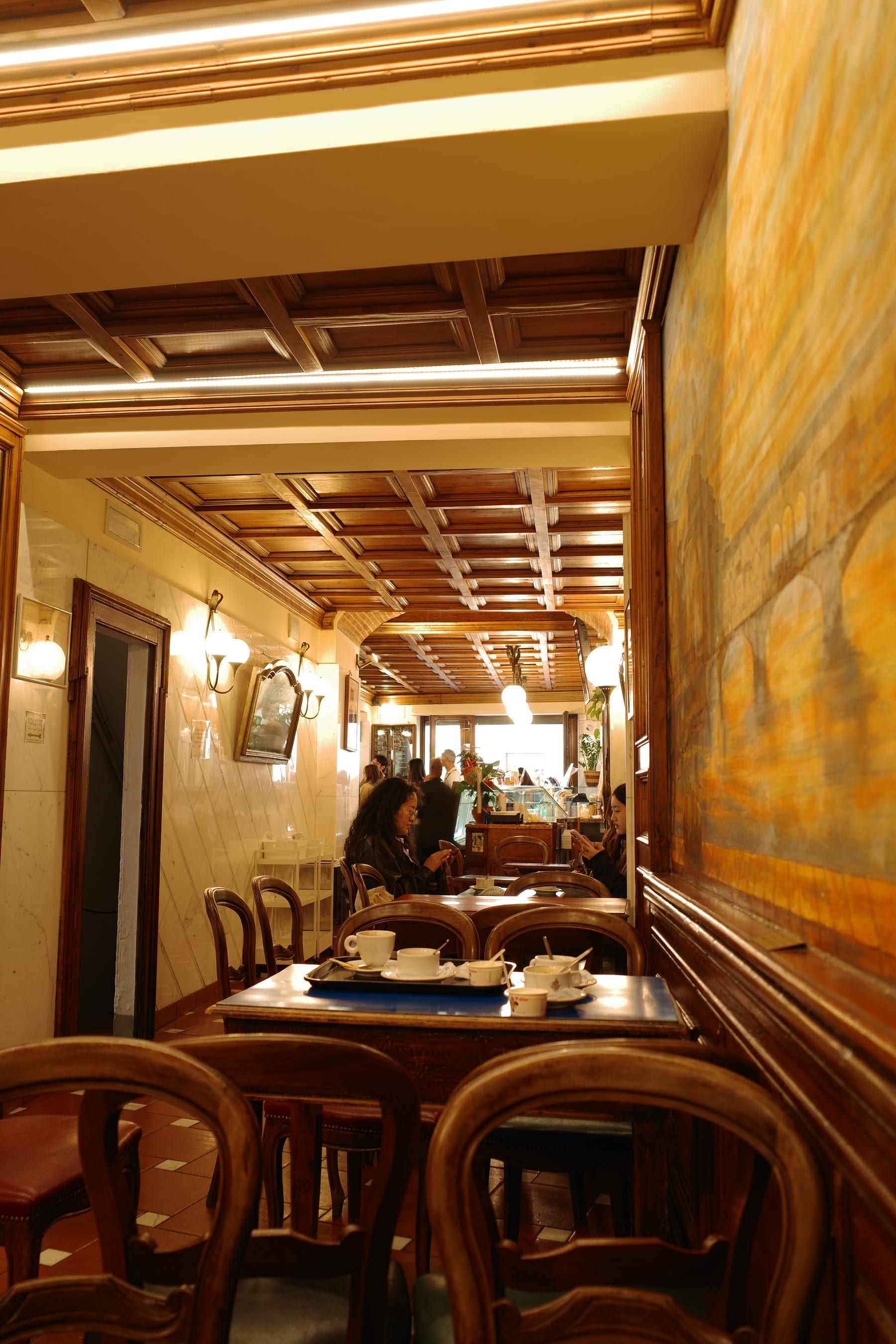 Warm wooden interior of Vivoli in Florence