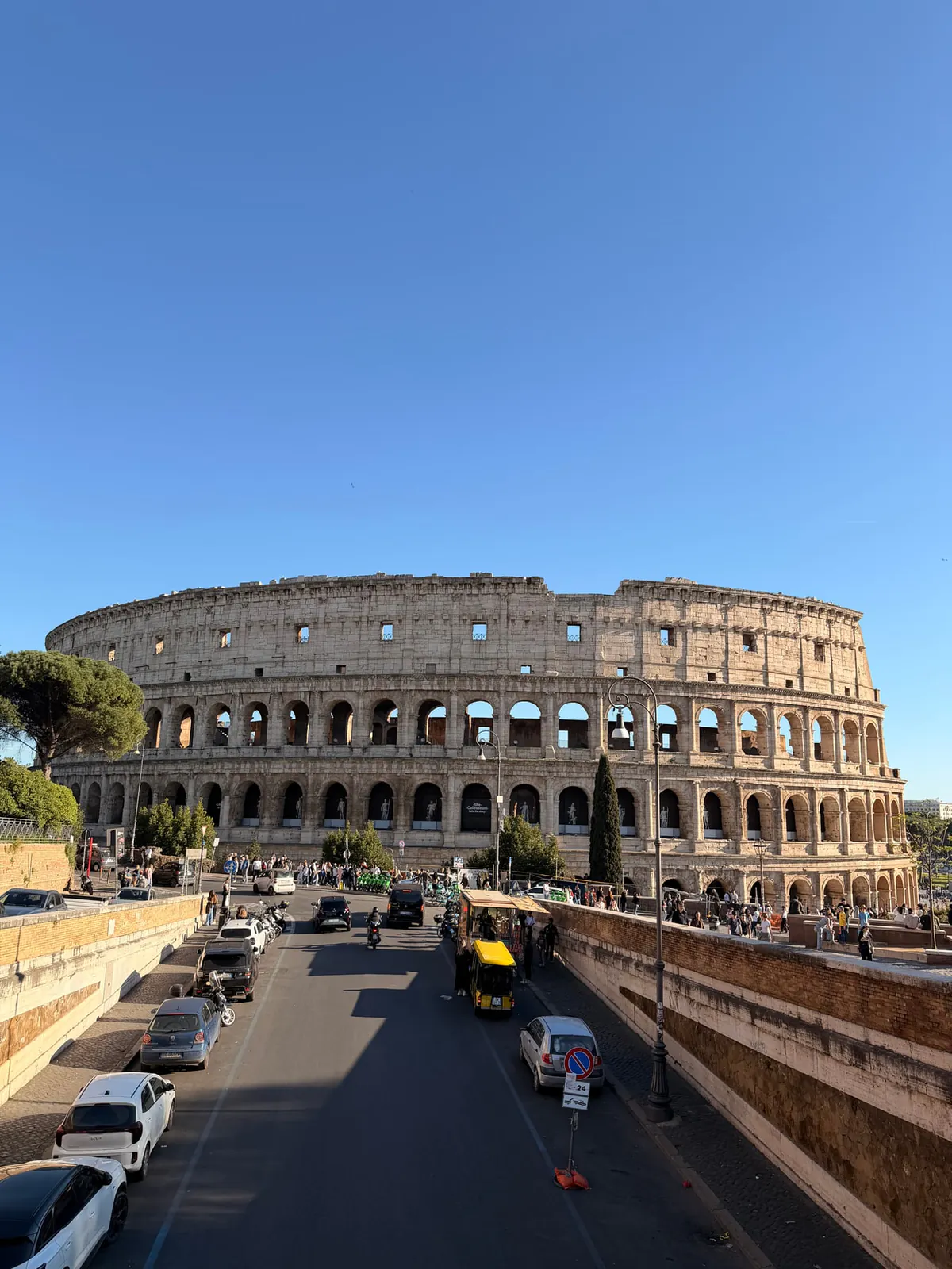 Wide exterior view of the Colosseum in Rome