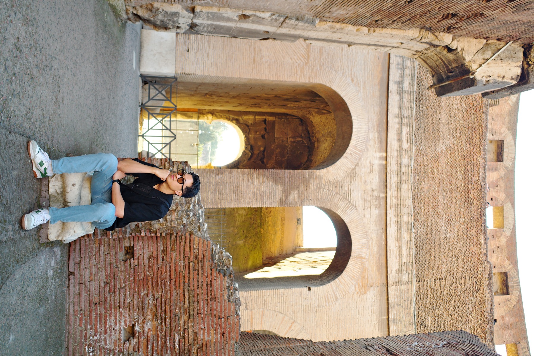 The Colosseum arena level with ancient brick arches