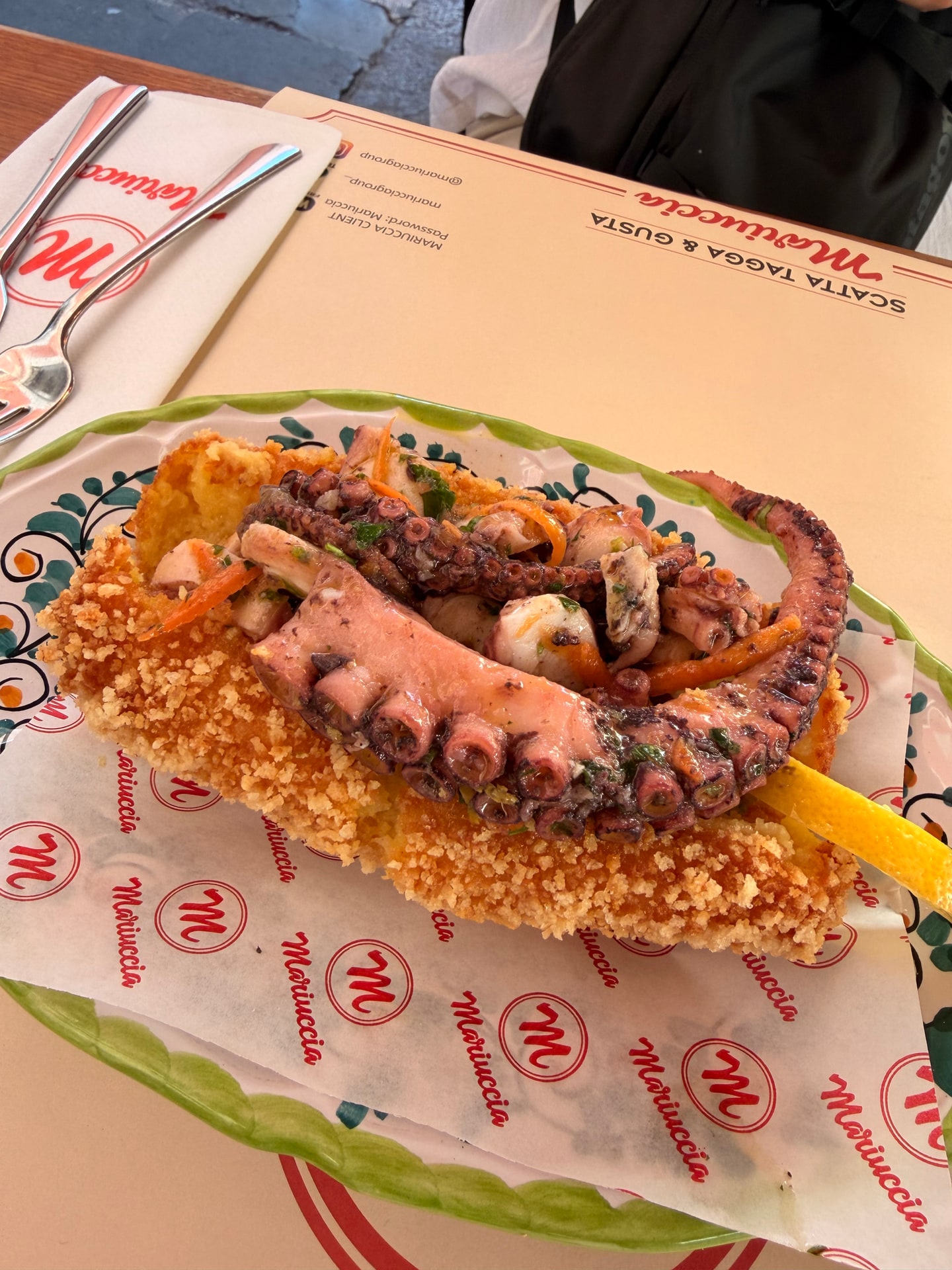 Fried croquette served with octopus at Mariuccia in Rome