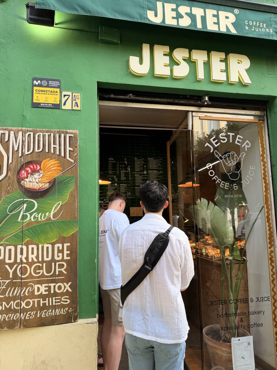 The green storefront of Jester Coffee and Juice in Seville