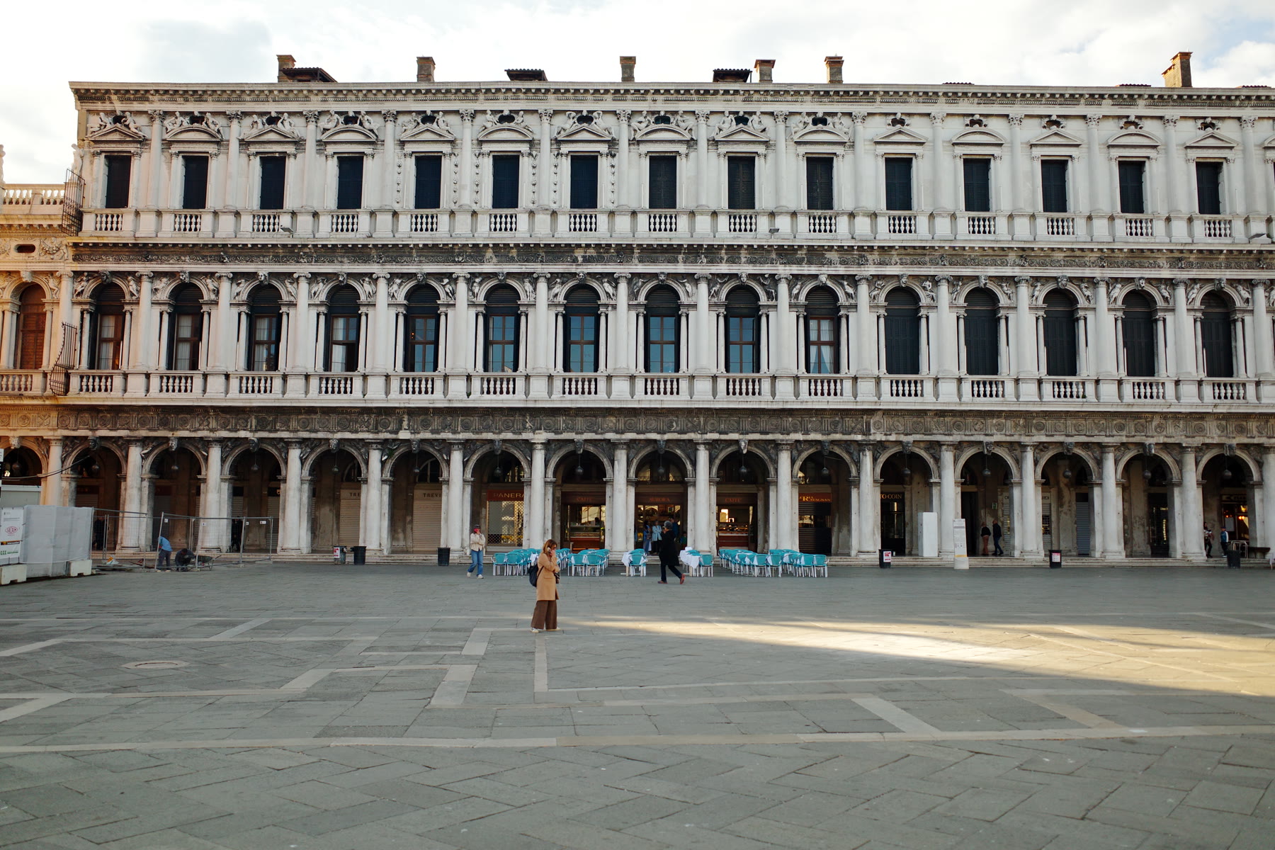 Arcaded facade lining Piazza San Marco in Venice