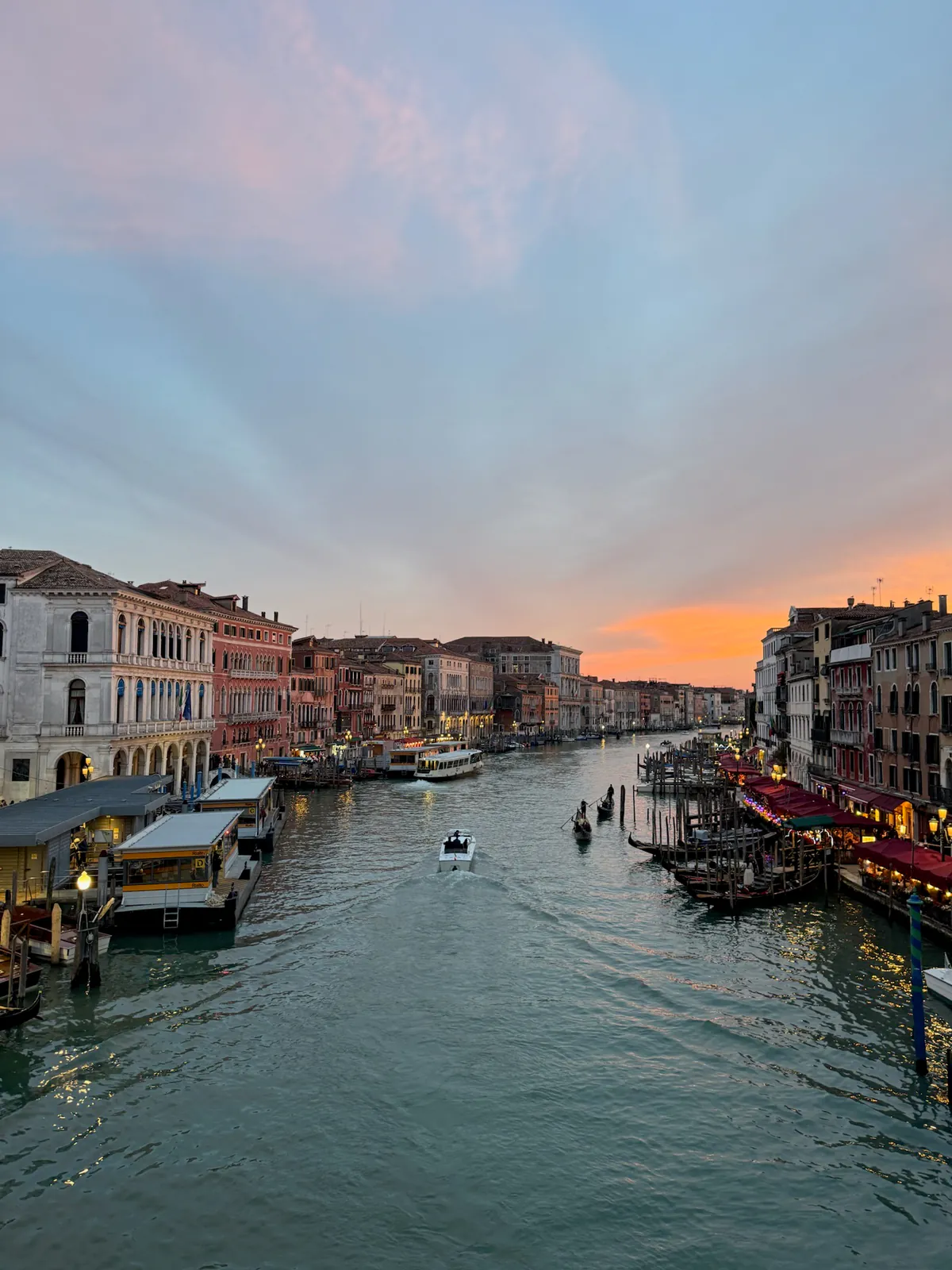 Grand Canal glowing at sunset from Rialto Bridge in Venice