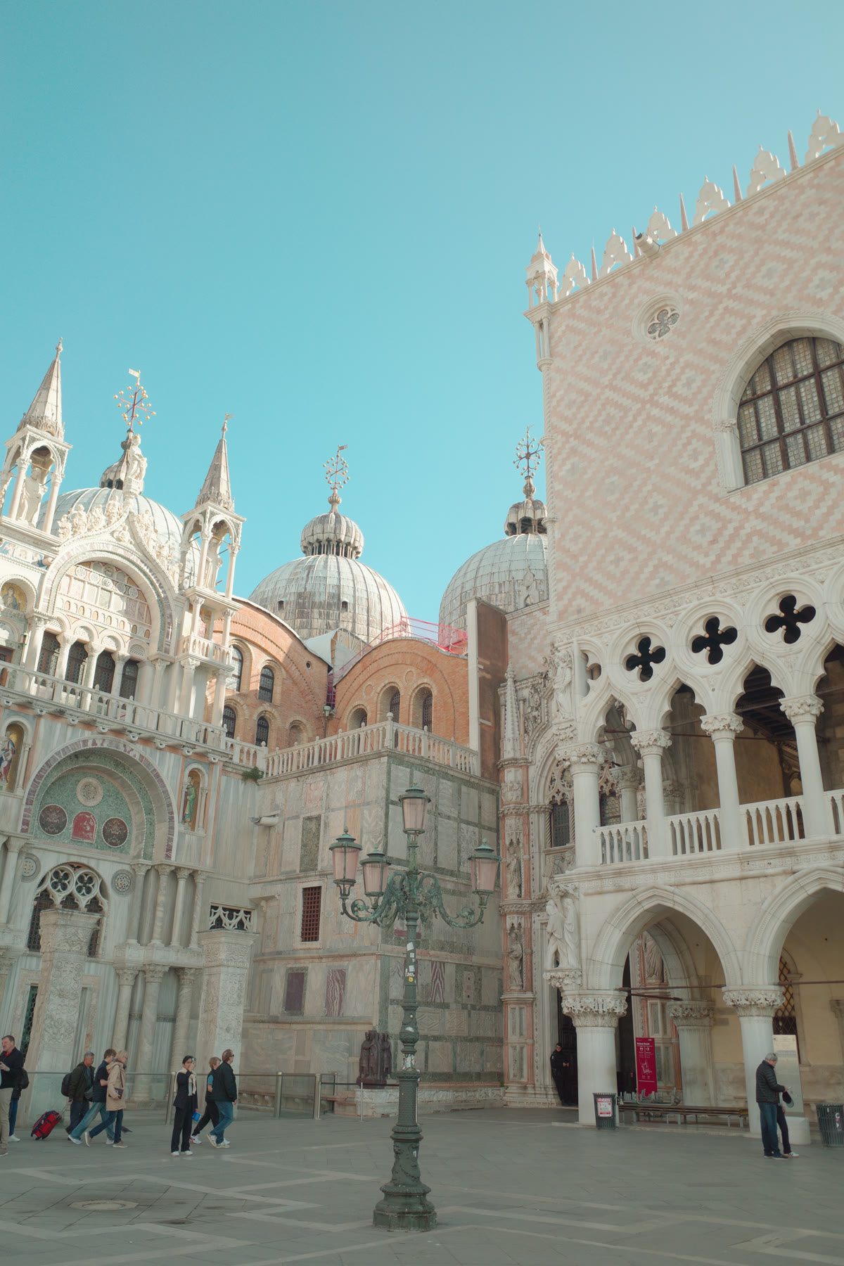 St. Mark's Basilica domes and the quatrefoil facade of Doge's Palace in Venice